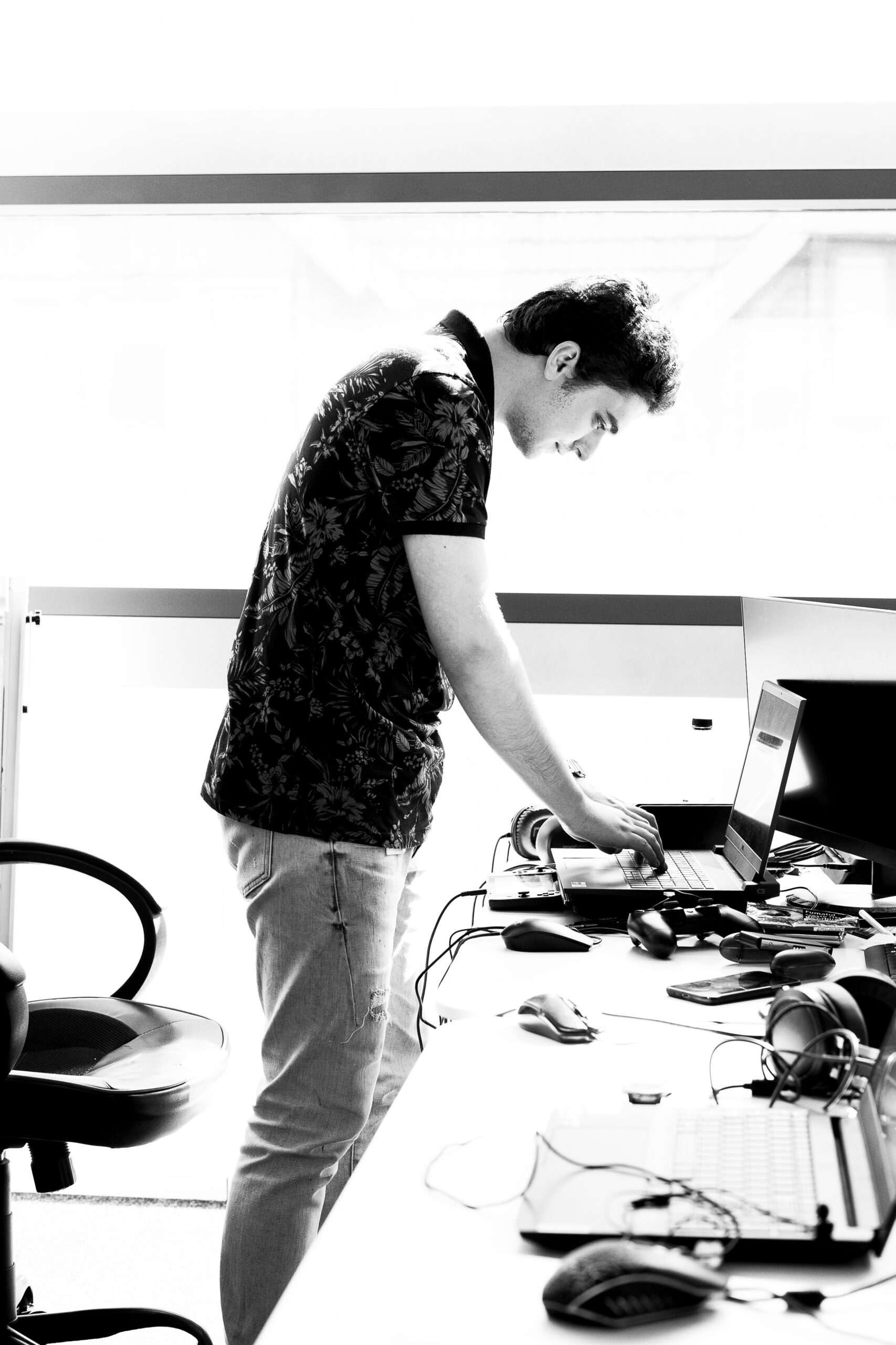 Pixel Bowl team member working at a desk in the studio